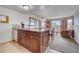 Kitchen boasts granite countertops and an island with additional seating at 6336 Parc Corniche Dr # 3303, Orlando, FL 32821