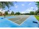 Blue and gray basketball court in a park setting at 2601 Gala S Rd # 107, Kissimmee, FL 34746