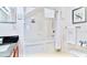 Clean bathroom with white tiled tub, shower, and granite vanity at 2601 Gala S Rd # 107, Kissimmee, FL 34746
