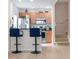 Well-equipped kitchen featuring stainless steel appliances, a breakfast bar, and ample storage at 2601 Gala S Rd # 107, Kissimmee, FL 34746