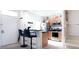 Stylish kitchen with stainless steel appliances, blue bar stools, and an entryway at 2601 Gala S Rd # 107, Kissimmee, FL 34746