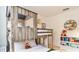 Charming ' room with wood bunk bed, storage shelves, and playful decor at 2601 Gala S Rd # 107, Kissimmee, FL 34746