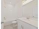 Clean bathroom with a shower/tub combo and white vanity at 707 Southern Edge Way, Sanford, FL 32771