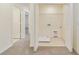 Bright laundry room with washer and dryer hookups and built-in shelving at 707 Southern Edge Way, Sanford, FL 32771