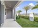 Private patio with access from living area and view of landscaped yard at 707 Southern Edge Way, Sanford, FL 32771