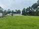 Large vacant lot with green grass, ready for development at 2815 N Leavitt Ave, Orange City, FL 32763