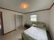 Cozy bedroom with a double bed and built-in closet at 2815 N Leavitt Ave, Orange City, FL 32763