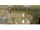 Aerial view showing home's location on a lot with surrounding properties and roads at 2815 N Leavitt Ave, Orange City, FL 32763