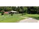 Ranch-style home with carport and fenced yard at 2815 N Leavitt Ave, Orange City, FL 32763