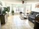 Spacious living room featuring a comfortable sectional sofa and ample natural light at 5009 Laguna Bay Cir # 41, Kissimmee, FL 34746