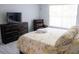 King-size bed, dresser, and recliner chair at 5009 Laguna Bay Cir # 41, Kissimmee, FL 34746