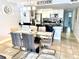Modern kitchen with white cabinets and black countertops at 5009 Laguna Bay Cir # 41, Kissimmee, FL 34746