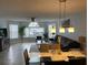 Bright living room with tile floors, sectional sofa, and large windows at 5009 Laguna Bay Cir # 41, Kissimmee, FL 34746