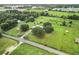 Aerial view of property showing house and road at 4711 County Road 134, Wildwood, FL 34785