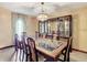 Bright dining room with a large table and built-in hutch at 4711 County Road 134, Wildwood, FL 34785