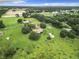 Aerial view of house and surrounding property at 4711 County Road 134, Wildwood, FL 34785