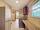 Laundry room with washer, dryer, and extra counter space at 4711 County Road 134, Wildwood, FL 34785