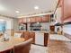 Spacious kitchen featuring granite countertops and ample cabinetry at 4711 County Road 134, Wildwood, FL 34785