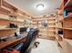 Home office with built-in shelving and work space at 4711 County Road 134, Wildwood, FL 34785