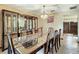 Bright dining room with a large table and built-in hutch at 4711 County Road 134, Wildwood, FL 34785