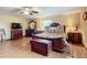 Large main bedroom with hardwood floors and plenty of closet space at 4711 County Road 134, Wildwood, FL 34785