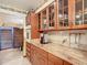 Kitchen with granite countertops and wood cabinets at 4711 County Road 134, Wildwood, FL 34785