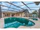 Large screened-in pool with ample patio space at 16208 Magnolia Hill St, Clermont, FL 34714