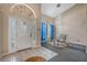 Bright and spacious entryway with a tiled floor and a small dining area at 16208 Magnolia Hill St, Clermont, FL 34714