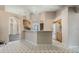 Bright kitchen with wood cabinets and white appliances at 16208 Magnolia Hill St, Clermont, FL 34714