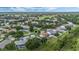 Home's location in a residential neighborhood with green spaces at 16208 Magnolia Hill St, Clermont, FL 34714