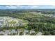 Property's location near wooded area, showcasing neighborhood and location at 16208 Magnolia Hill St, Clermont, FL 34714