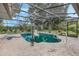 Screened-in pool area with pool lift and surrounding patio at 16208 Magnolia Hill St, Clermont, FL 34714