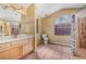 Main bathroom with walk-in shower, toilet and sink at 16208 Magnolia Hill St, Clermont, FL 34714