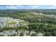 Wide view of the home and its surroundings, highlighting the location at 16208 Magnolia Hill St, Clermont, FL 34714