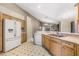 Kitchen with stainless steel appliances and a breakfast bar at 16208 Magnolia Hill St, Clermont, FL 34714