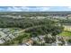 Wide view of the home and surrounding neighborhood, showcasing the location at 16208 Magnolia Hill St, Clermont, FL 34714