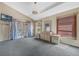 Spacious bedroom with carpeting and patio doors at 16208 Magnolia Hill St, Clermont, FL 34714