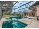 Relaxing screened-in pool and patio area at 16208 Magnolia Hill St, Clermont, FL 34714