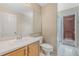 Bathroom with single sink vanity and shower at 16208 Magnolia Hill St, Clermont, FL 34714