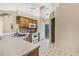 Kitchen features a double sink and wood cabinets at 16208 Magnolia Hill St, Clermont, FL 34714