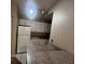 Kitchen with white appliances and granite countertops at 6312 Raleigh St # 513, Orlando, FL 32835