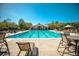 Resort-style pool with plenty of lounge chairs at 720 Celebration Ave # 220, Celebration, FL 34747