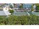Aerial view of a charming town with various shops and a lake at 720 Celebration Ave # 220, Celebration, FL 34747