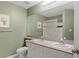Bathroom with double vanity and shower/tub combo at 720 Celebration Ave # 220, Celebration, FL 34747