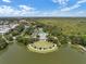 Community clubhouse with pool, tennis courts, and lake at 720 Celebration Ave # 220, Celebration, FL 34747