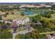 Aerial view of clubhouse near golf course and lake at 720 Celebration Ave # 220, Celebration, FL 34747