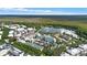 Aerial perspective of a town with a central lake at 720 Celebration Ave # 220, Celebration, FL 34747