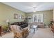 Spacious living room with two sofas and a glass coffee table at 720 Celebration Ave # 220, Celebration, FL 34747