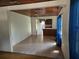 Open dining area with view into the kitchen at 10 Mccarthy Ave, Frostproof, FL 33843