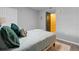 Guest bedroom with teal bedding and access to hallway at 1052 Lotus Cove Ct # 743, Altamonte Springs, FL 32714
